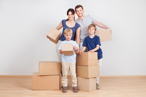 Loading furniture into a moving truck in Clapham
