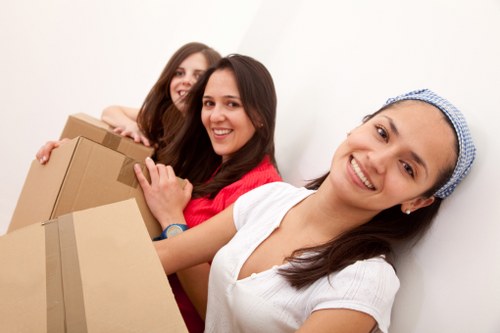 Clapham moving service handling a sofa and household items