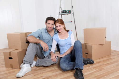 Movers loading items into a removal van in Clapham