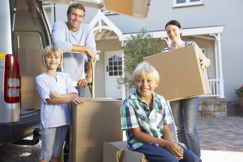 Local movers carrying furniture in Clapham