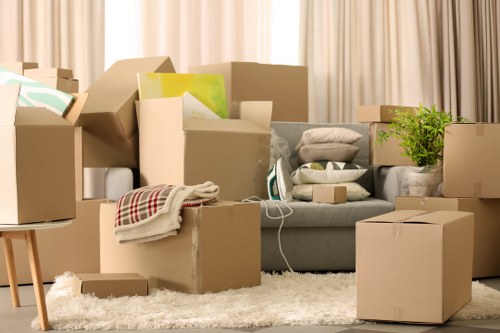 Office move preparation with labelled boxes and equipment
