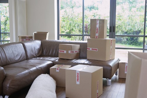 A packing team preparing household items for transport in Clapham