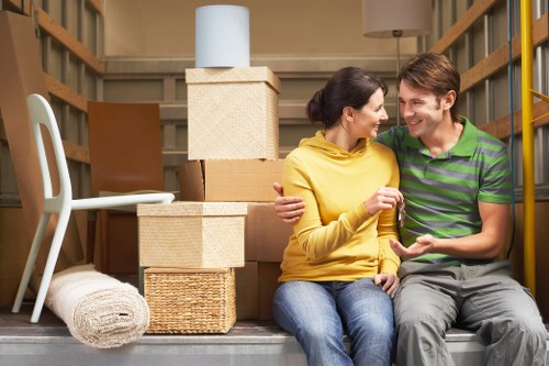 Professional office moving team handling equipment during Clapham relocation