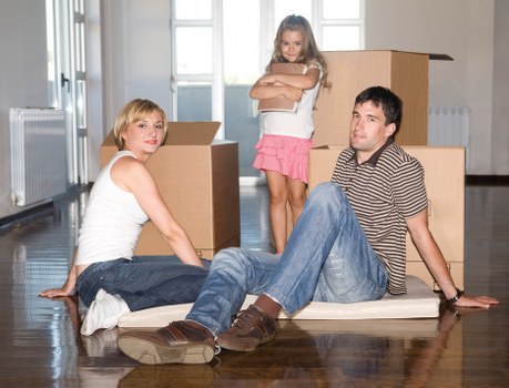 Local moving team handling boxes in Clapham